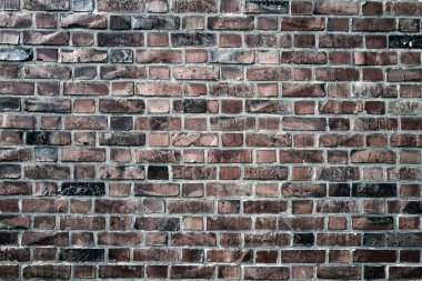 Duvarın arkasında tuğla var. Tuğla duvarın desenli arka planı. Duvar deseni. Arka planda duvar grunge. Web pankartı için arkaplan.