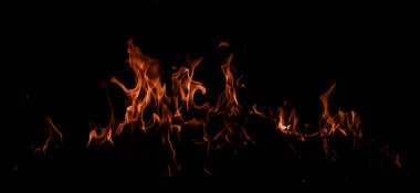 Yangın arka plan kıvılcımları. Soyut alevler arka planı. Yanan ateş. Siyah arka planda ateş dokusu. Reklam için kopyalama alanı olan alevi ateşle