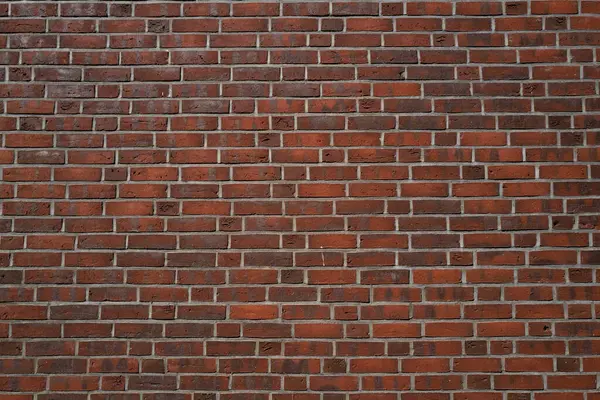 Duvar önü, duvar tasarımı. Taş kaplama. Pankart olarak tuğla desenli duvar. Taş duvar dokusu. Tasarım için tuğla işleri arka planı