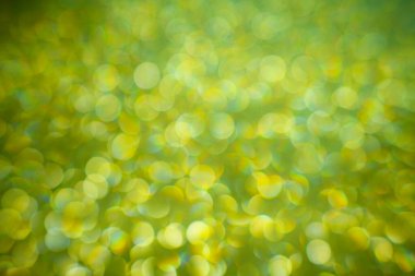 Yeşil Bokeh Tatil geçmişleri. Bokeh geçmişi. Pırıl pırıl arka plan. Parlak desen soyut arkaplan. Soyut Tatil. Bokeh geçmişi. Kopyalama alanı olan soyut arkaplan