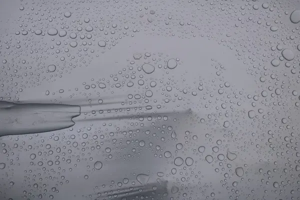 drops on a glass. drops of water on a glass