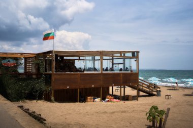         Burgas, Bulgaria - June 17, 2023:   a restaurant on the beach in Burgas                            clipart