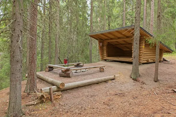 Shelter with fire place in summer forest, Katikankanjoni, Kauhajoki, Finland.