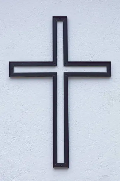 Closeup Black Metal Cross White Stone Building Exterior Wall — Stock Photo, Image