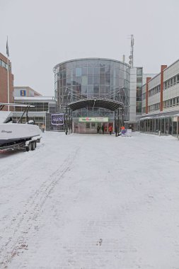 Pasila, Helsinki, Finland - 2.14.2024: Main entrance to Vene (Boat) 2024 fair at Messukeskus Helsinki (Expo and Convention Centre) in cloudy winter weather.