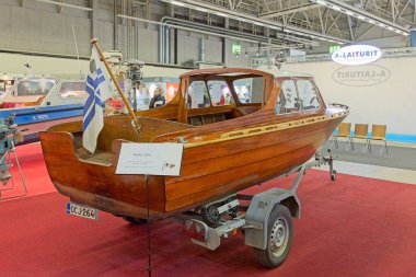 Pasila, Helsinki, Finland - 2.14.2024:  Satella Cabin boat on display at Vene (Boat) 2024 fair at Messukeskus Helsinki (Expo and Convention Centre).