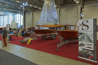 Pasila, Helsinki, Finland - 2.14.2024: Mahogany Yachting Society fair department exhibition hall at Vene (Boat) 2024 fair at Messukeskus Helsinki (Expo and Convention Centre).
