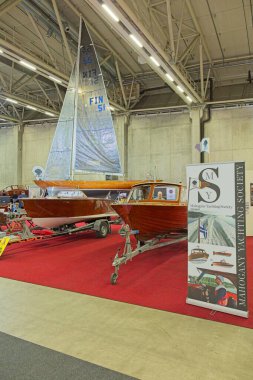 Pasila, Helsinki, Finland - 2.14.2024: Mahogany Yachting Society fair department exhibition hall at Vene (Boat) 2024 fair at Messukeskus Helsinki (Expo and Convention Centre).