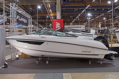 Pasila, Helsinki, Finland - 2.14.2024:  Flipper 650 boat on display at Vene (Boat) 2024 fair at Messukeskus Helsinki (Expo and Convention Centre).