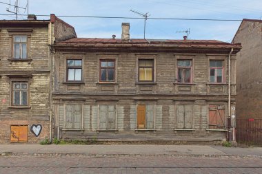Riga, Latvia - June 21, 2019: Old weathered wood building.