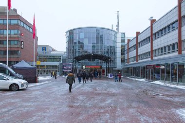 Pasila, Helsinki, Finland - 2.3.2024: Main entrance to MP 24 Motorcycle fair at Messukeskus Helsinki (Expo and Convention Centre) in cloudy winter weather.