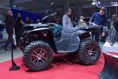Pasila, Helsinki, Finland - 2.3.2024: Access Xtreme Shade 600 EPS EFI T3b ATV on display at MP 24 Motorcycle fair at Messukeskus Helsinki (Expo and Convention Centre).