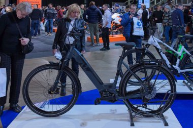 Pasila, Helsinki, Finland - 2.3.2024: Raymon Tourray E 6.5 electric bike on display at MP 24 Motorcycle fair at Messukeskus Helsinki (Expo and Convention Centre).