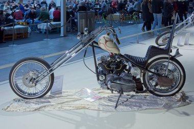 Pasila, Helsinki, Finland - 2.3.2024:  Custom Porte Fesses motorcycle on display at MP 24 Motrorcycle fair at Messukeskus Helsinki (Expo and Convention Centre). clipart