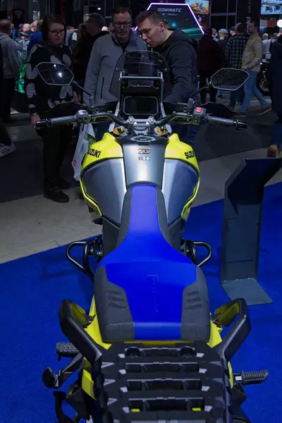 Pasila, Helsinki, Finland - 2.3.2024: Suzuki V-Strom 1050 DE motorcycle on display at MP 24 Motorcycle fair at Messukeskus Helsinki (Expo and Convention Centre).