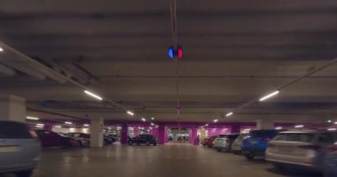 Pasila, Helsinki, Finland - 4.16.2023:  POV view of car driving in Mall of Tripla (shopping mall) underground parking garage.