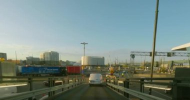 Helsinki, Finland - July 17.2023: POV view from car driving  out off Finlandia car ferry to Helsinki port in summer.
