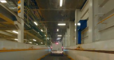 Helsinki, Finland - July 17.2023: POV view from car driving  out off Finlandia car ferry to Helsinki port in summer.
