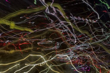 Abstract light trails motion background at night made by ICM (Intentional camera movement) technique. clipart