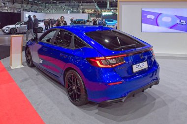 Pasila, Helsinki, Finlandiya 14 Mart. 2025: AUTO 25 'te Honda Civic Hybrid Spor Araba ve Messukeskus Helsinki' de Mobilite Show.