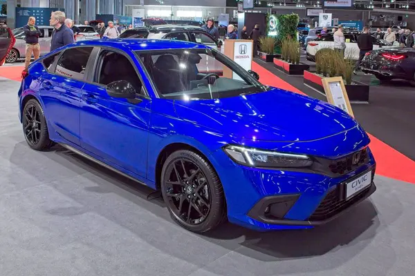 Pasila, Helsinki, Finlandiya 14 Mart. 2025: AUTO 25 'te Honda Civic Hybrid Spor Araba ve Messukeskus Helsinki' de Mobilite Show.