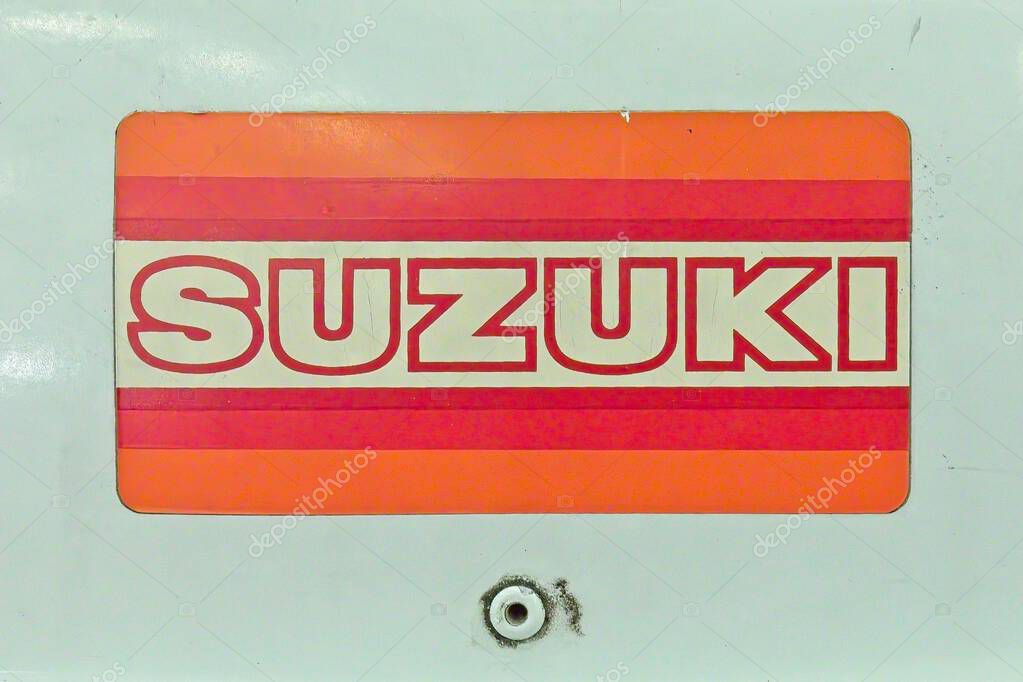 Pasila, Helsinki, Finland  February 12. 2025: Closeup of old Suzuki logo on outboard motor at Vene (Boat) 2025 show at Messukeskus Helsinki.