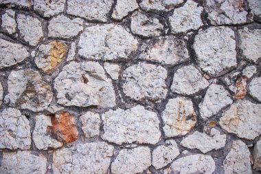 İspanya 'nın El Papiol kentindeki tarihi bir binanın desenli, desenli bir duvarının fotoğrafı.
