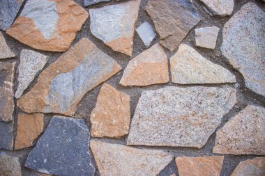 İspanya 'nın El Papiol kentindeki tarihi bir binanın desenli, desenli bir duvarının fotoğrafı.