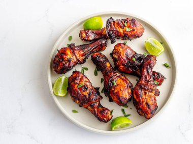 Grilled BBQ Chicken on a Plate Top Down Chicken Appetizer Photo