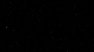 Siyah arka planda minimalist bir yıldız alanı ve küçük beyaz noktalar. Dış uzayı, evren derinliğini ya da kozmik sakin atmosferi temsil eder..