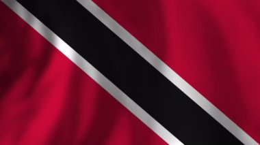 Trinidad ve Tobago 'nun ulusal bayrağı ulusal gurur ve kültürel kimliği temsil eden doymuş kırmızı arka plana karşı canlı renklerle dalgalanır.
