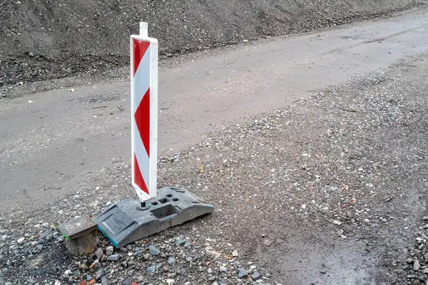 Warning beacon on a road construction site