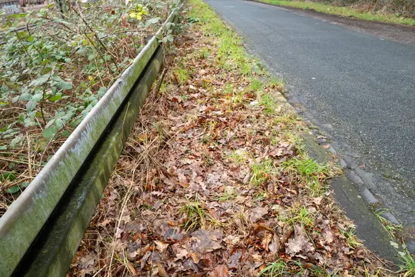 old road with crash barrier
