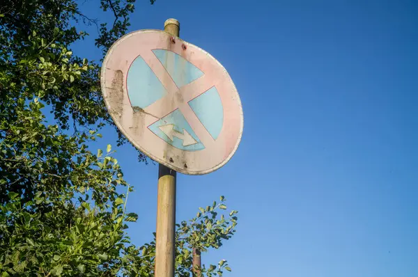 stock image faded old no stopping sign in germany