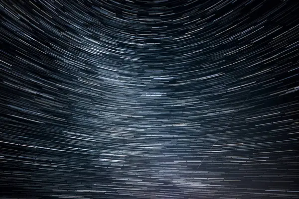 stock image Star tracks of Milky Way galaxy. Movement of stars in the night sky. Night starry sky and Milky Way galaxy.