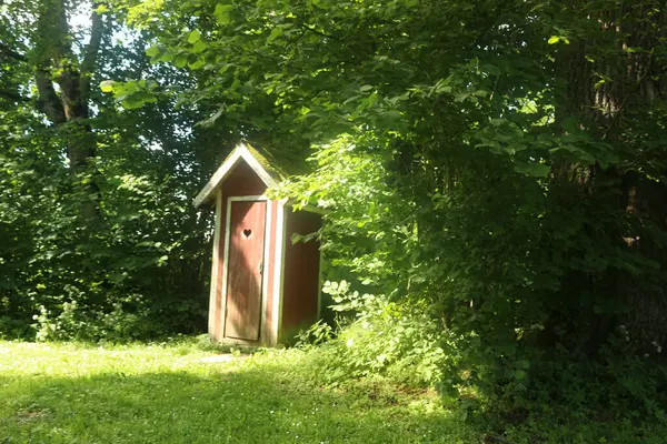 a little wooden wc house in the country