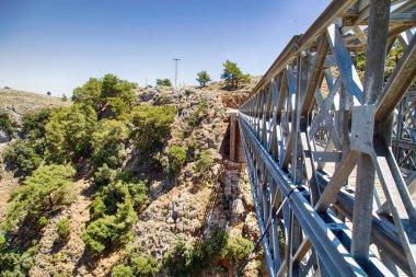 Metal Bridge over the Aradena Canyon on the island of Crete (Greece) clipart