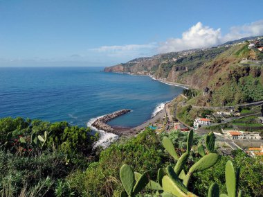 View of the cliffs of Madeira near the town of Ribeira Brava (Madeira, Portugal) clipart