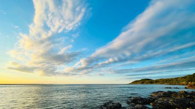 Denizin üzerinde güzel bir gün batımı, 1770, Queensland, Avustralya 
