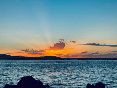 Denizin üzerinde güzel bir gün batımı, 1770, Queensland, Avustralya 