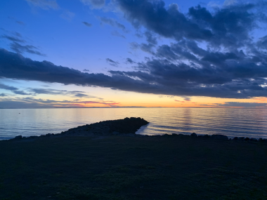 Denizde gün batımı, Kuzey Stradbroke Adası, Queensland, Avustralya