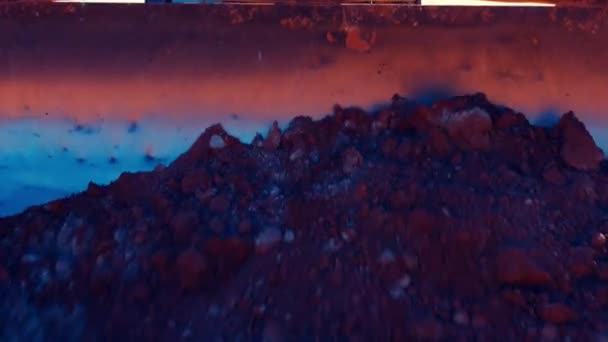 Static Shot Bulldozer Pushing Red Blue Clay Stones Camera Large — Stock Video