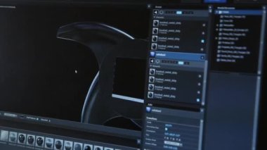 Bilgisayar ekranının yakın plan çekimleri, grafik modeli üzerinde çalışan CGI uzmanı