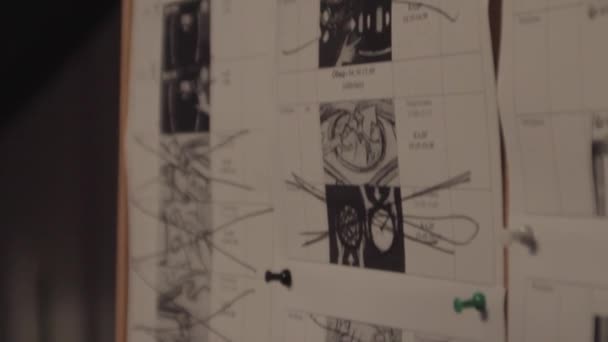 Pedestal Closeup Shot Board Storybord Drawings One Being Striked Out — Stock Video