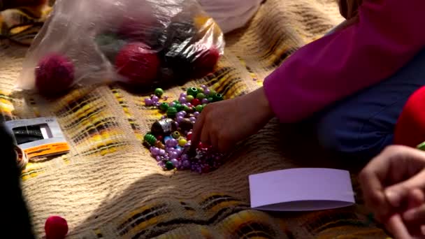 Hand Held Close Shot Girls Hands Sorting Beads Handicraft Workshop — Stock Video