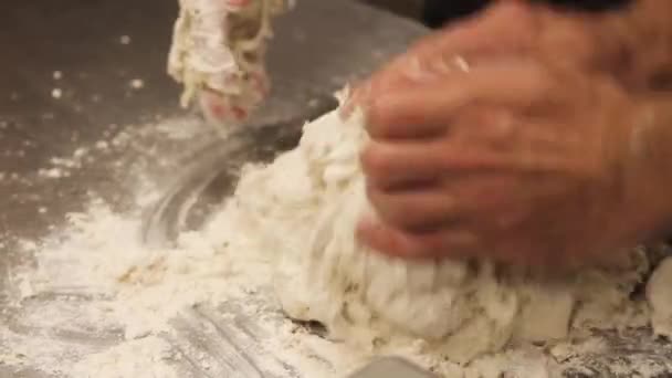 Close Shot Cook Showing Apprentice How Knead Dough — Stock Video