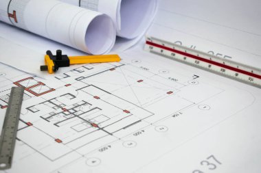 Mimari ve inşaat planları. Projeleri inşa etmek için teknik çizimler ve ölçüm araçları.