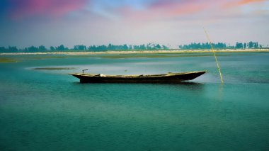 Beautiful evening moment with boat. Boat on the river.