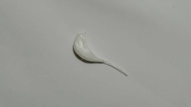 Healthy garlic on a white background. Garlic spice on white.