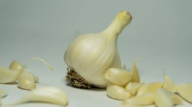 Healthy garlic on a white background. Garlic spice on white.